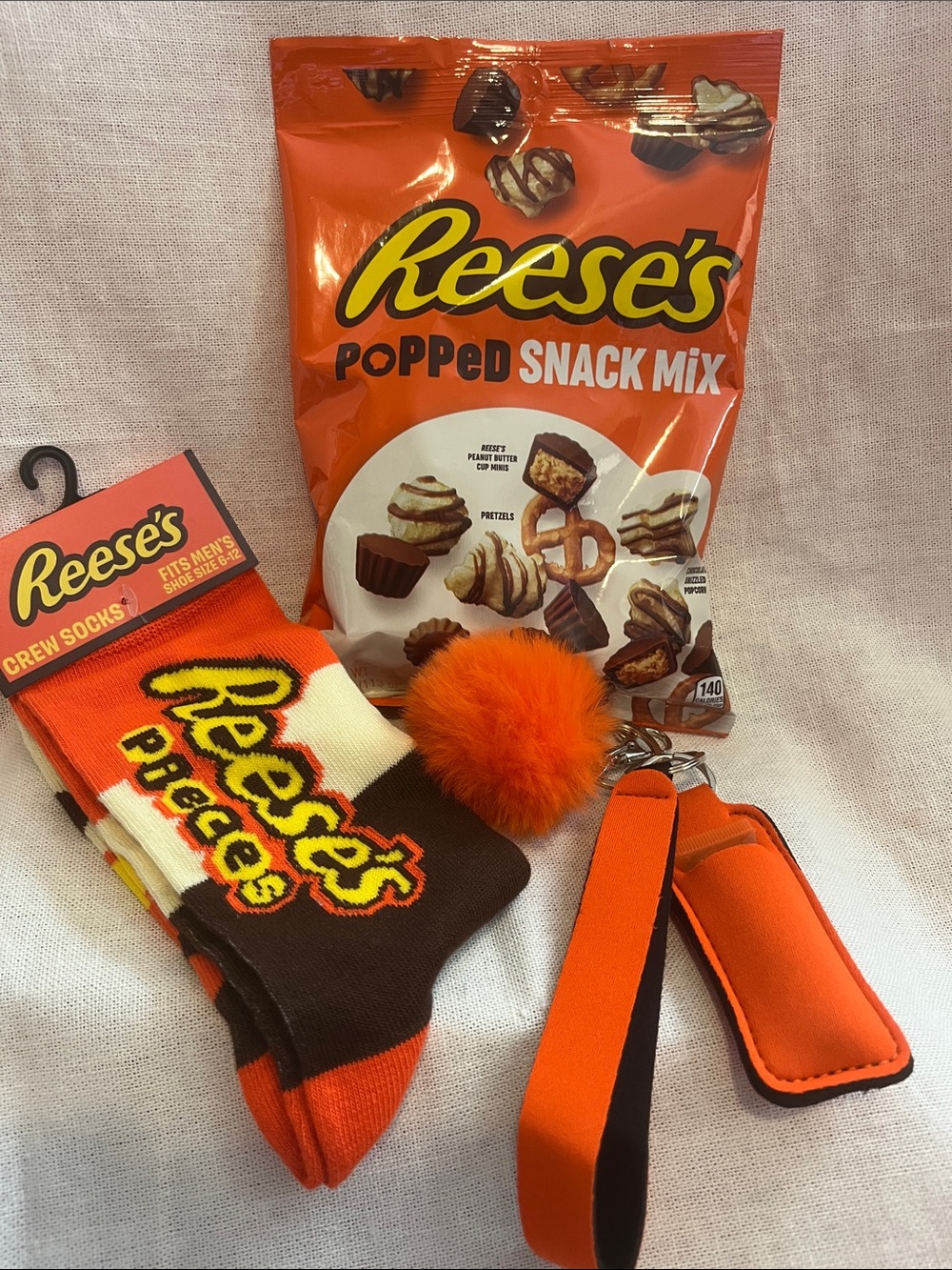 Reese’s Orange Crew Socks with Pom Pom Keychain Bundle